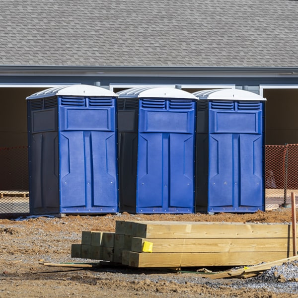 what is the cost difference between standard and deluxe portable toilet rentals in New London New Hampshire